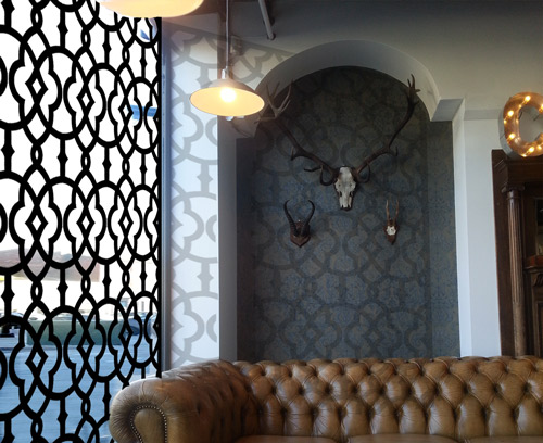 arabic and islamic pattern laser cut metal screen in picture cafe