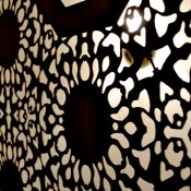 Perforated black Laser cut screen in Nottingham Lace pattern