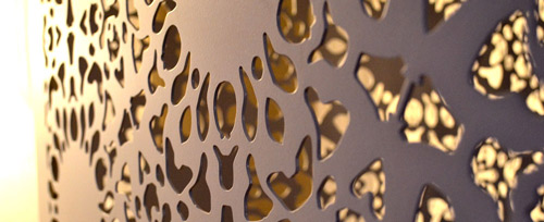 white laser cut metal lace screen detail